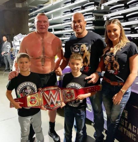 Turk Lesnar with his father, Brock Lesnar, and brother.